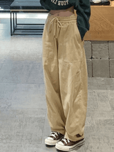 Pantalones rectos con bolsillo y cintura alta